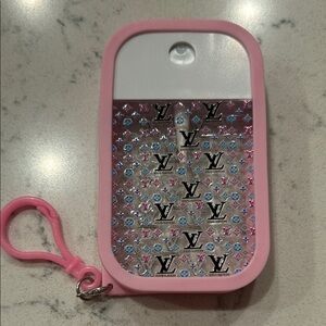 Refillable hand sanitizer